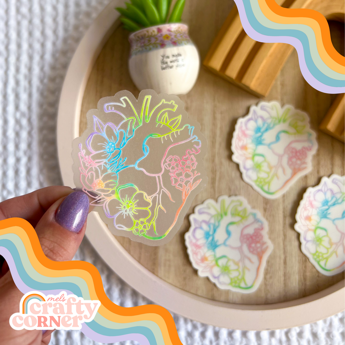 Floral Anatomical Heart design on colorful clear sticker, main product image by Mel's Crafty Corner