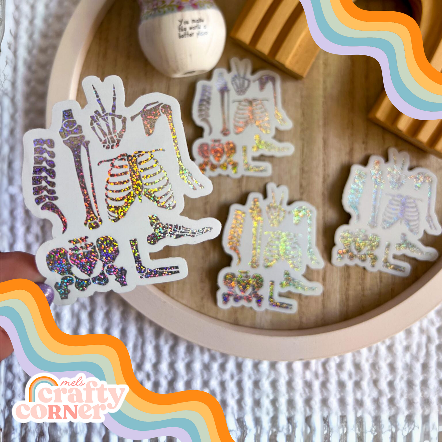 Skeleton Boneyard design on holographic sticker, main product image by Mel's Crafty Corner