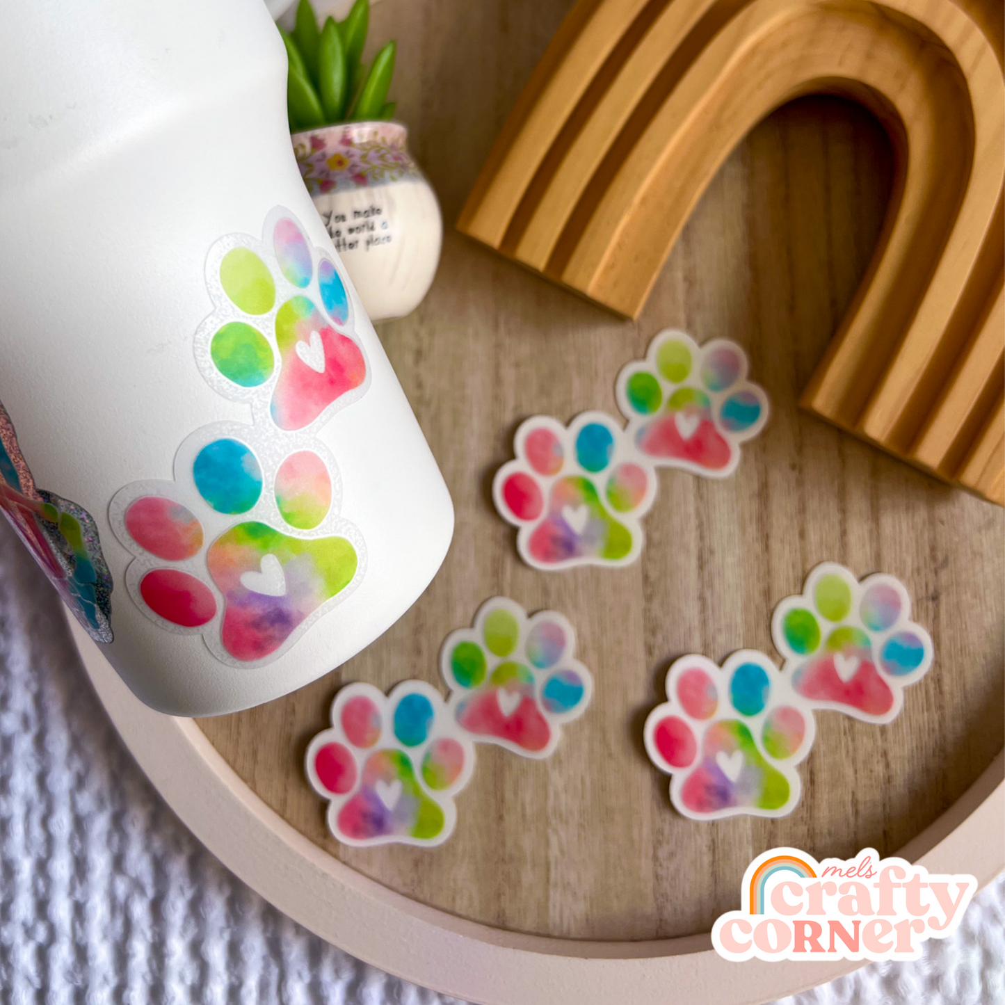 Colorful paw print clear sticker showing transparent background