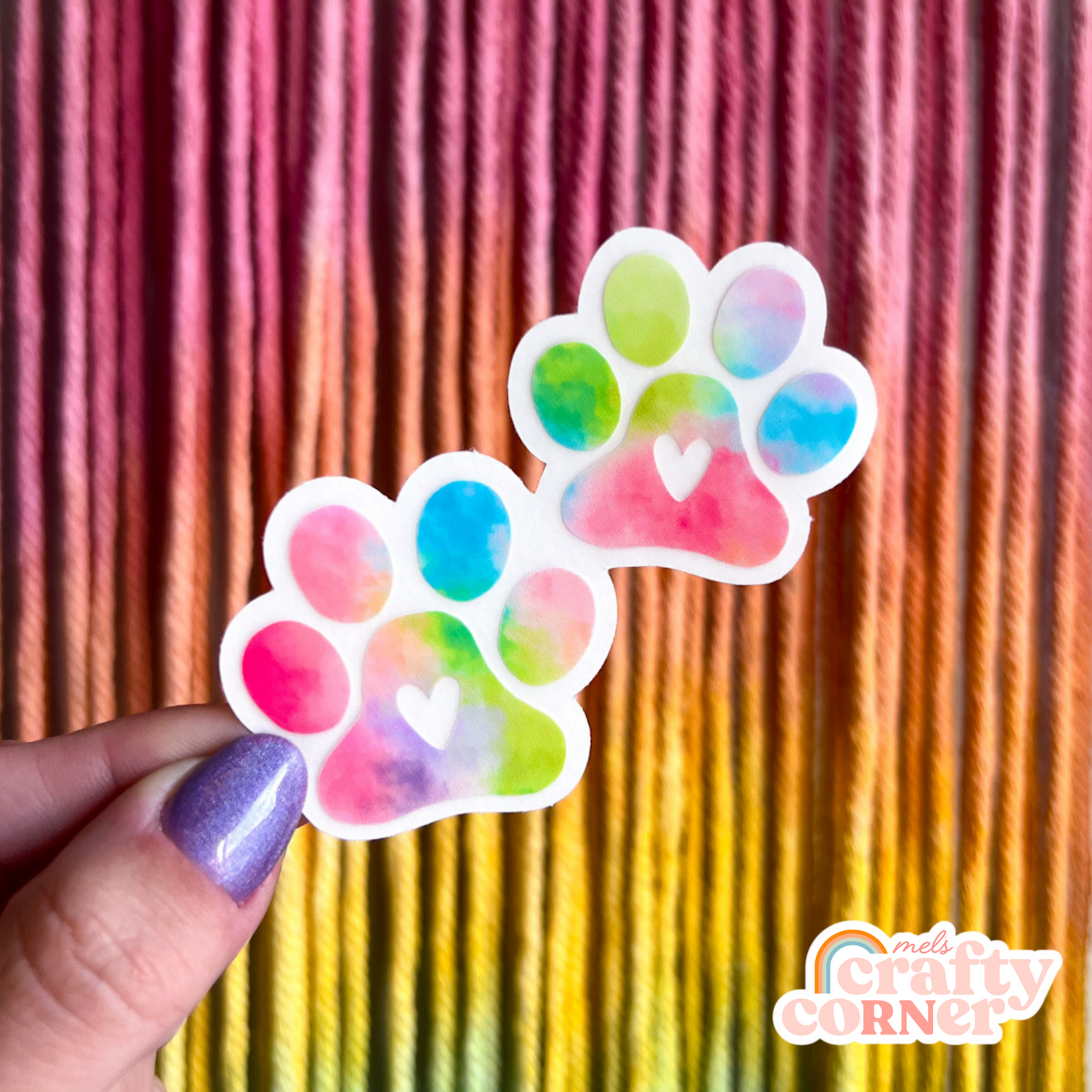 Multiple colorful paw print clear stickers artfully arranged