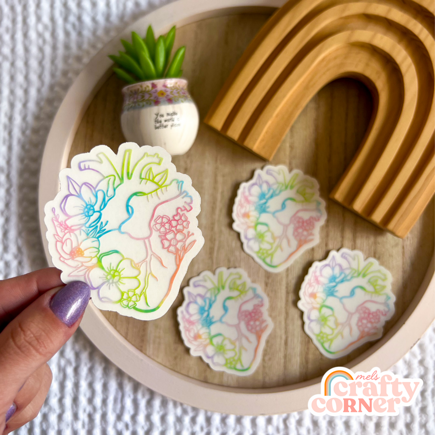 Floral Anatomical Heart colorful clear sticker applied to water bottle showing usage example by Mel's Crafty Corner