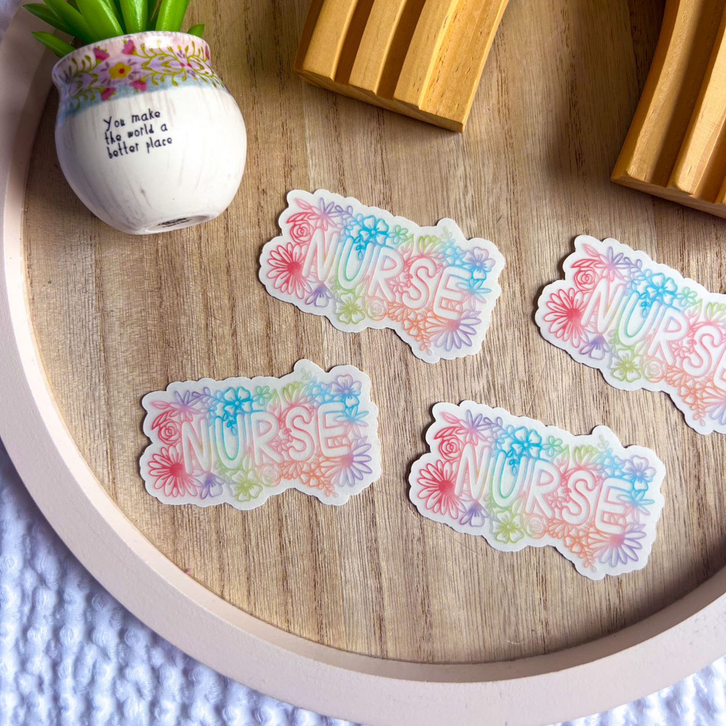 Multiple stickers including Floral Nurse colorful clear sticker showing collection display by Mel's Crafty Corner