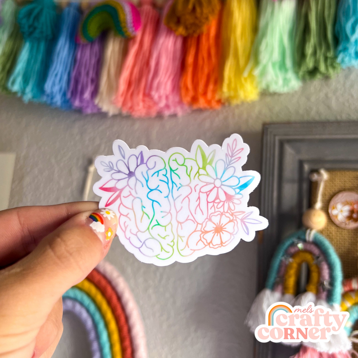 Second view of multiple stickers with Floral Anatomical Brain colorful matte sticker in different setting by Mel's Crafty Corner
