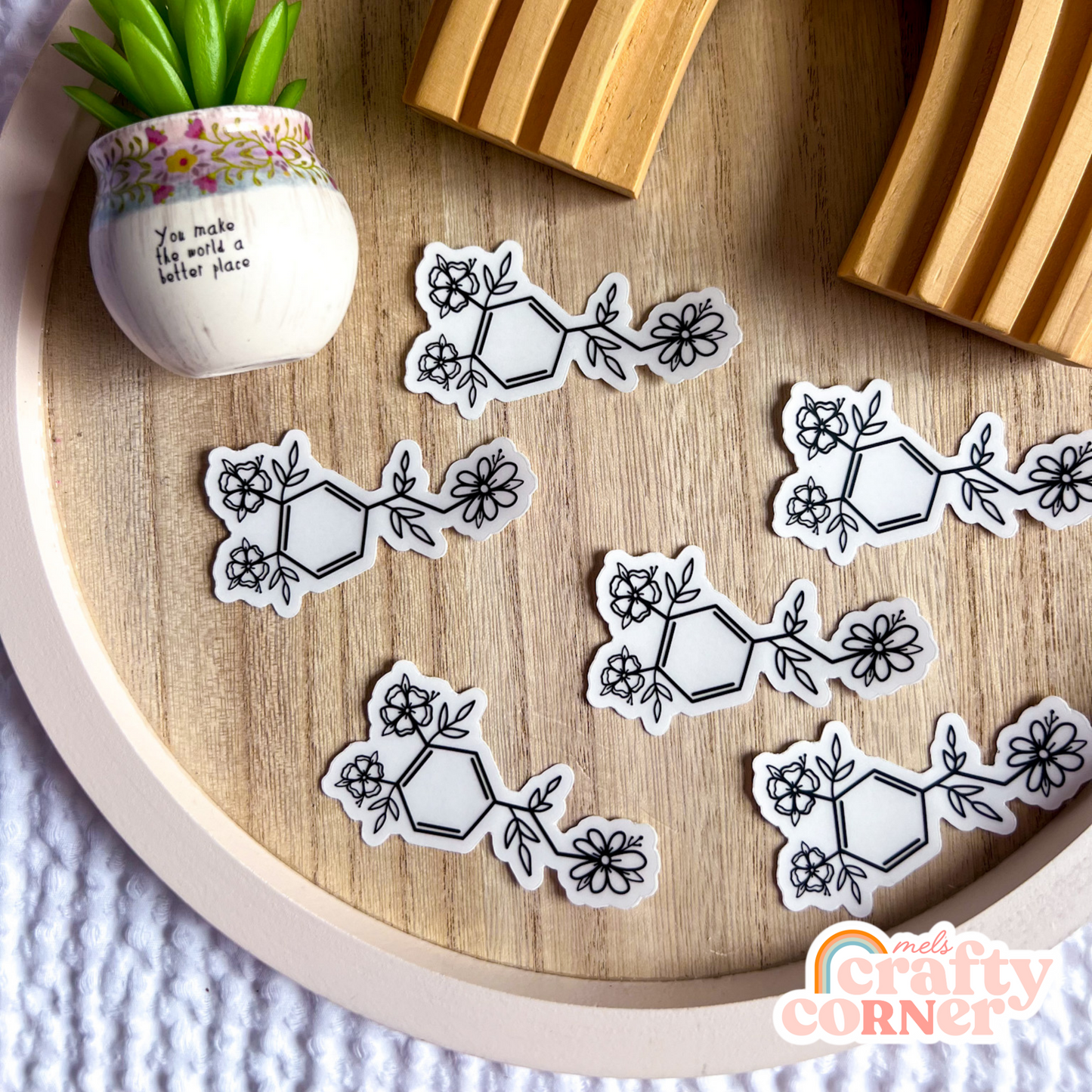 Floral Dopamine black clear sticker positioned on surface