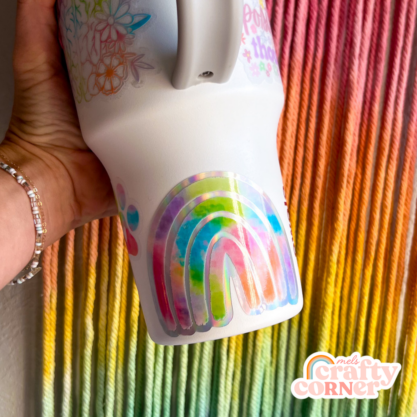 Multiple stickers including Rainbow colorful holographic sticker showing collection display by Mel's Crafty Corner