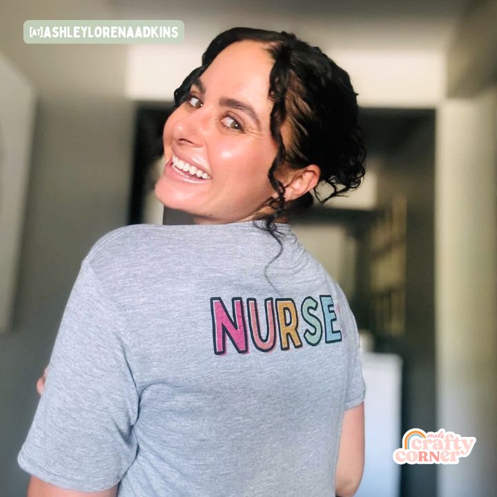 Back view of model Ashley wearing Colorful Nurse classic t-shirt by Mel's Crafty Corner