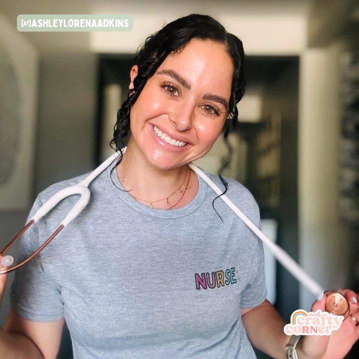 Front view of model Ashley wearing Colorful Nurse classic t-shirt by Mel's Crafty Corner