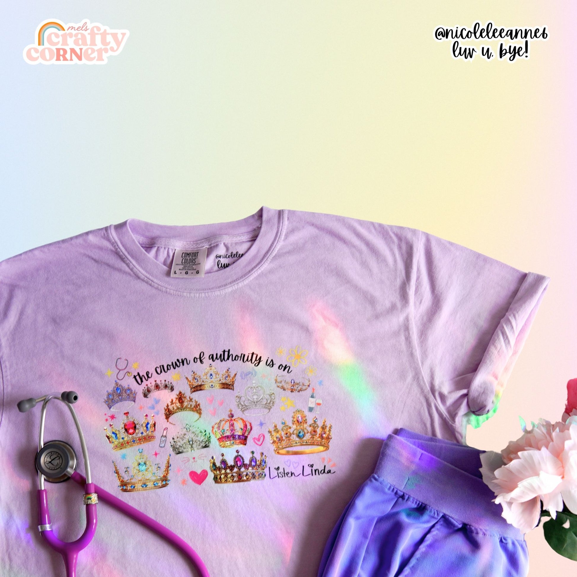 Flat lay of Orchid Crown of Authority T-Shirt by Mel's Crafty Corner