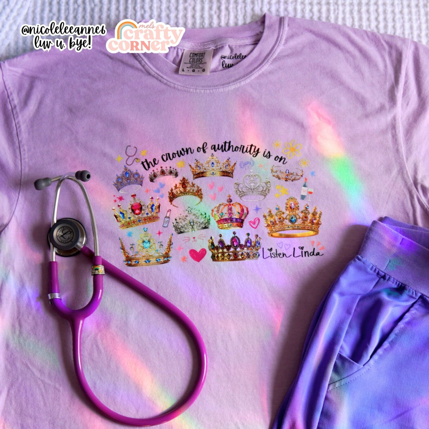 Crown of Authority t-shirt laid out with stethoscope and scrub pants