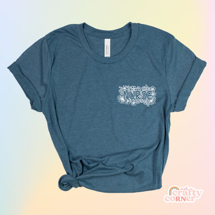Heather deep teal Pocket Floral Nurse T-Shirt product mockup