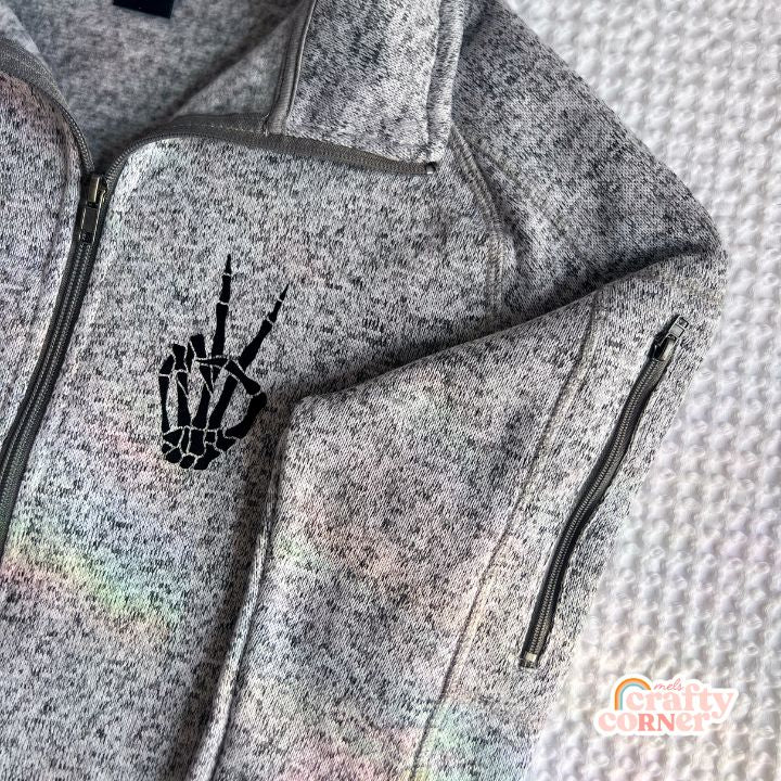 Heather grey Build Your Boneyard fleece zip-up jacket showing zipper detail by Mel's Crafty Corner