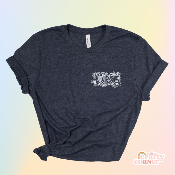 Heather navy Pocket Floral Nurse T-Shirt product mockup