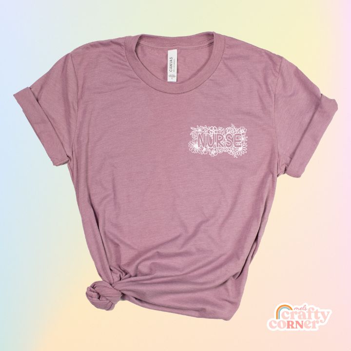 Heather orchid Pocket Floral Nurse T-Shirt product mockup