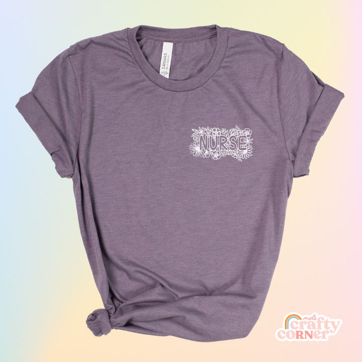 Heather purple Pocket Floral Nurse T-Shirt product mockup