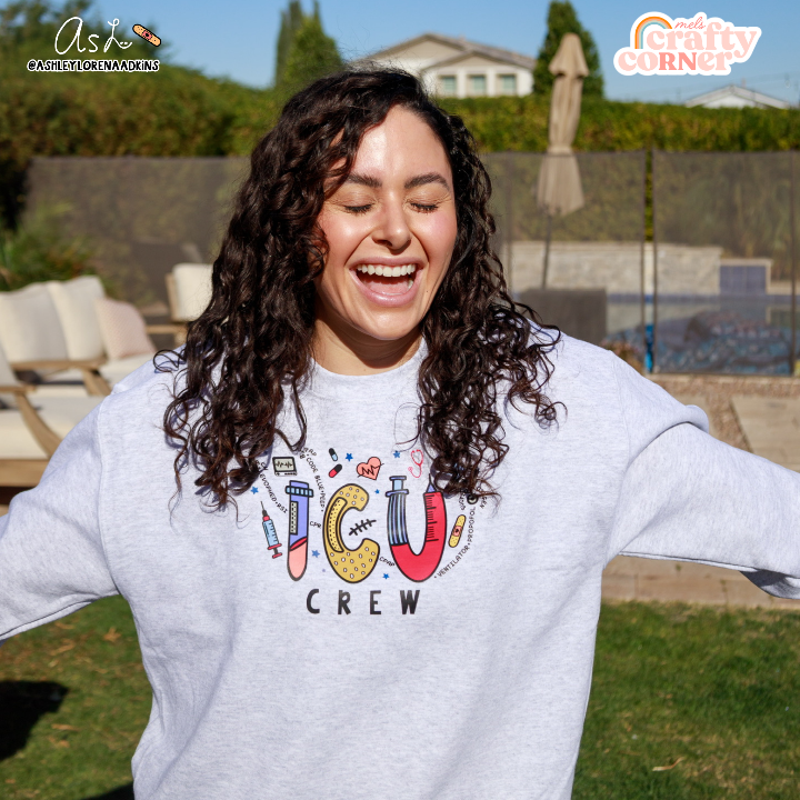 Second modeling view of ICU Crew Merch ash gray crewneck sweatshirt by Ashley by Mel's Crafty Corner