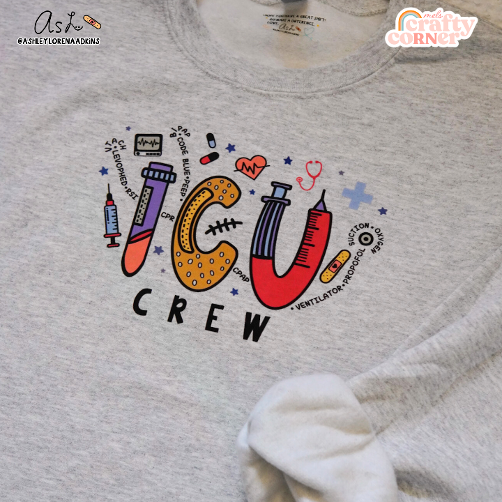 Front view of ICU Crew Merch ash gray crewneck sweatshirt by Mel's Crafty Corner