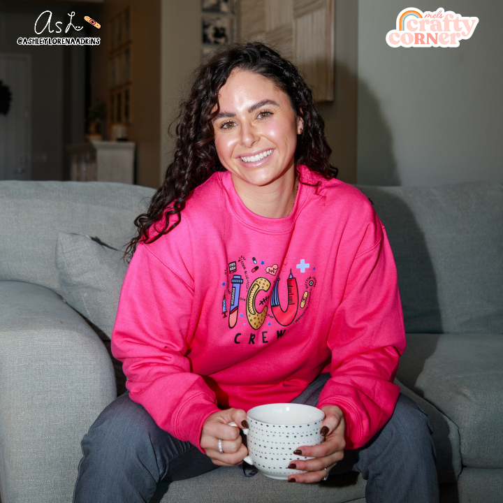 Second modeling view of ICU Crew Merch heliconia pink crewneck sweatshirt by Ashley by Mel's Crafty Corner