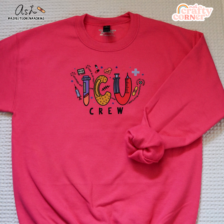 Second view of ICU Crew Merch heliconia pink crewneck sweatshirt showing design details by Mel's Crafty Corner