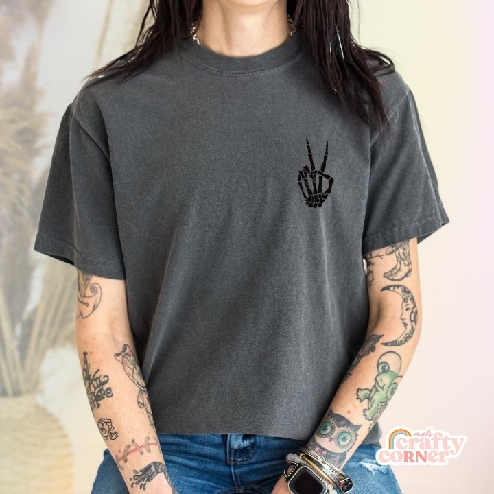 Model wearing pepper (dark gray) Build Your Boneyard premium t-shirt by Mel's Crafty Corner