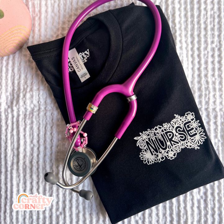 Close-up of Pocket Floral Nurse T-Shirt design