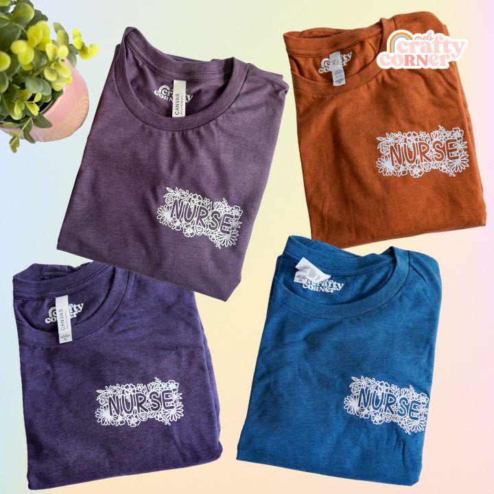 Pocket Floral Nurse T-Shirts laid flat showcasing design