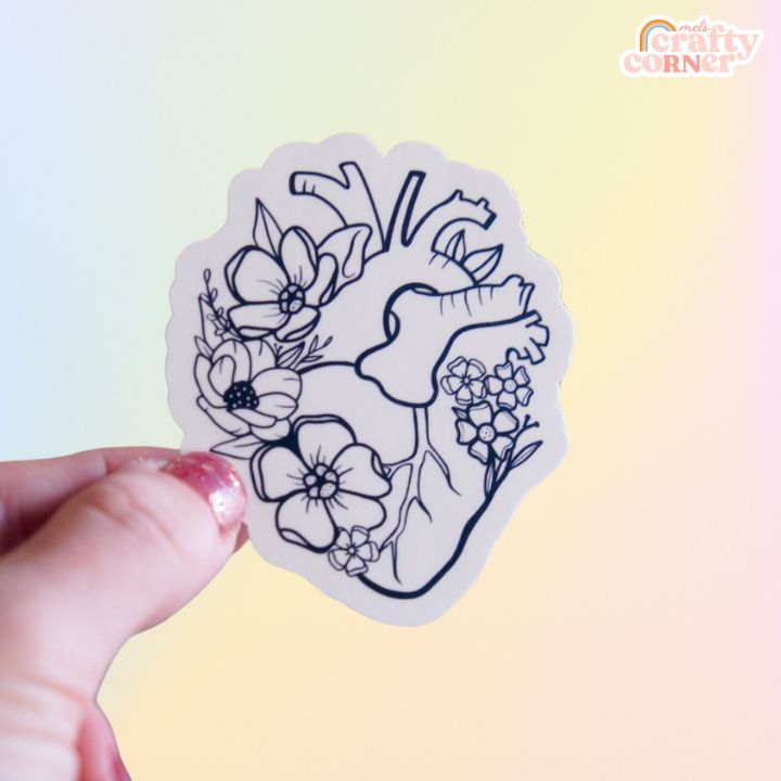 Close-up of Floral Anatomical Heart black matte sticker showing matte finish and details by Mel's Crafty Corner