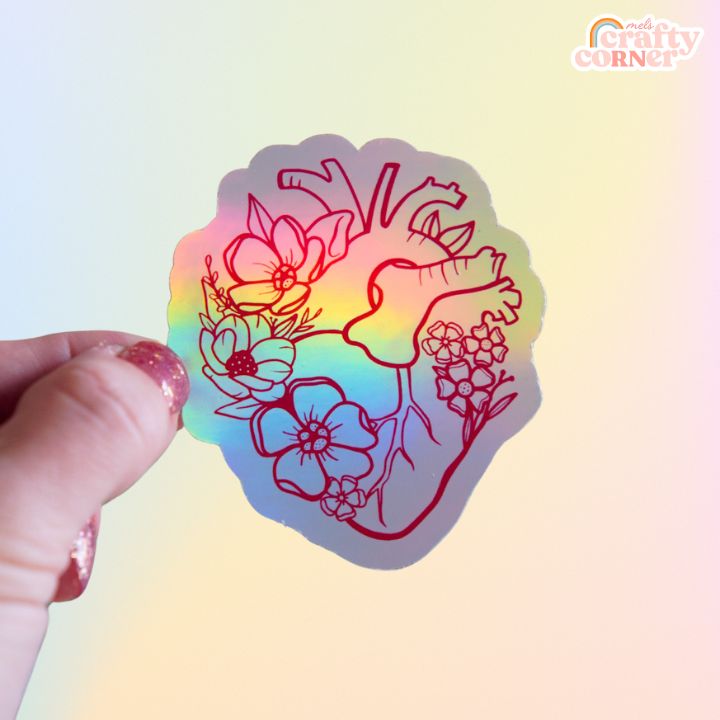 Close-up of Floral Anatomical Heart red holographic sticker showing holographic effect by Mel's Crafty Corner