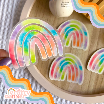 Rainbow design on colorful clear sticker, main product image by Mel's Crafty Corner