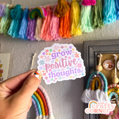 Hand holding Grow Positive Thoughts matte sticker showing size and scale by Mel's Crafty Corner
