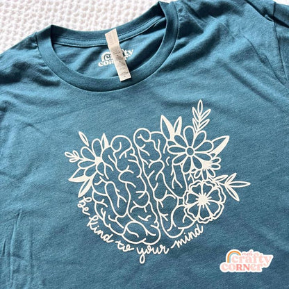 Deep teal Be Kind to Your Mind t-shirt laid flat