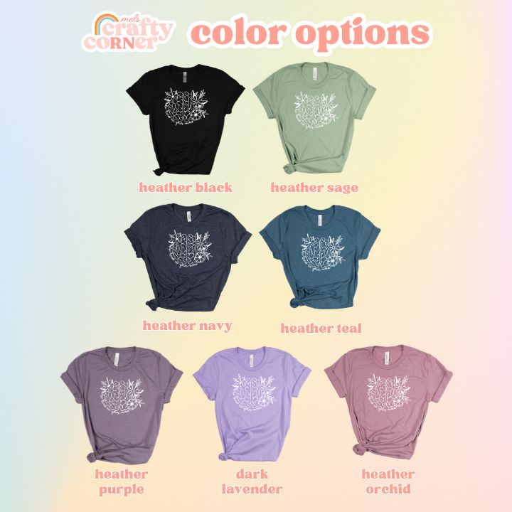Multiple color variations of Be Kind to Your Mind soft t-shirt displayed