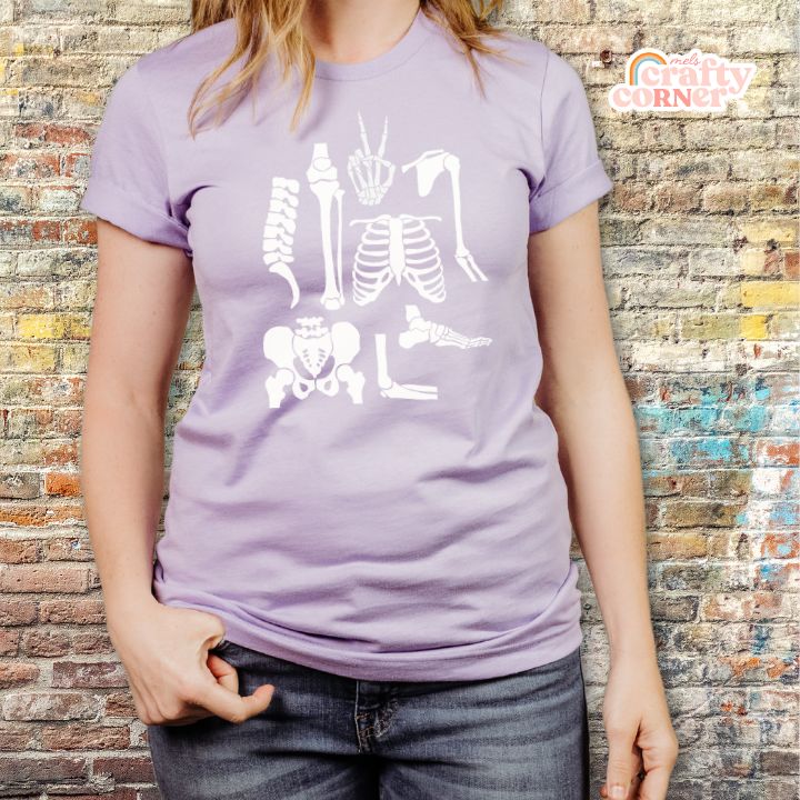 Model wearing lavender Build Your Boneyard softest t-shirt by Mel's Crafty Corner