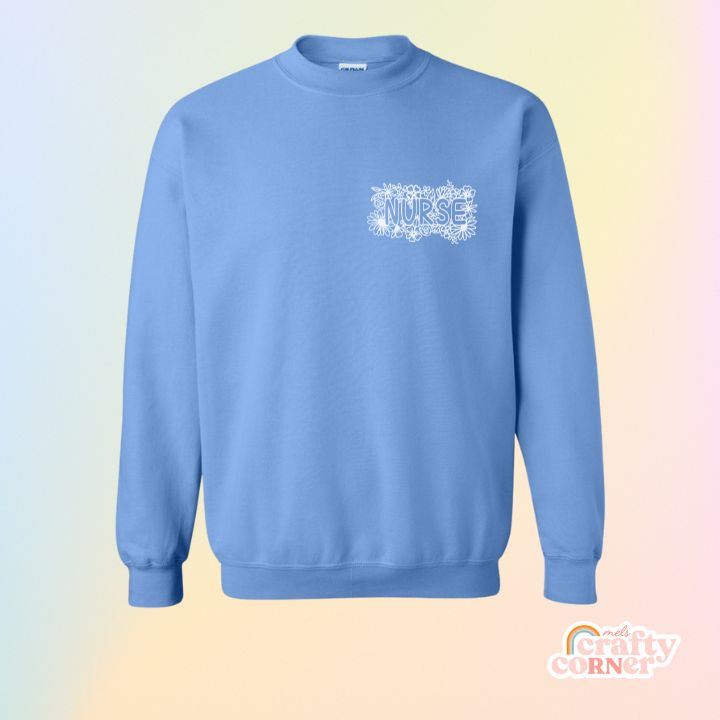 Carolina blue Pocket Floral Nurse classic crewneck sweatshirt mockup by Mel's Crafty Corner