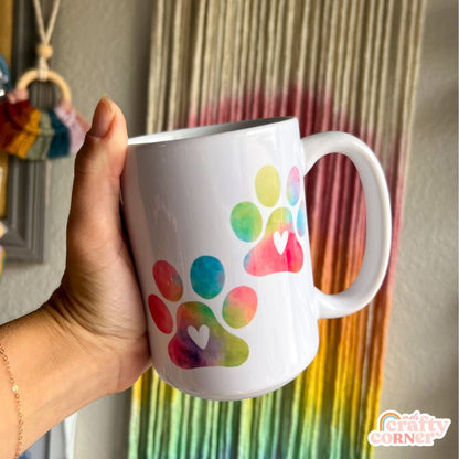 Second side view of Colorful Paw Print 15 oz ceramic mug showing design details by Mel's Crafty Corner