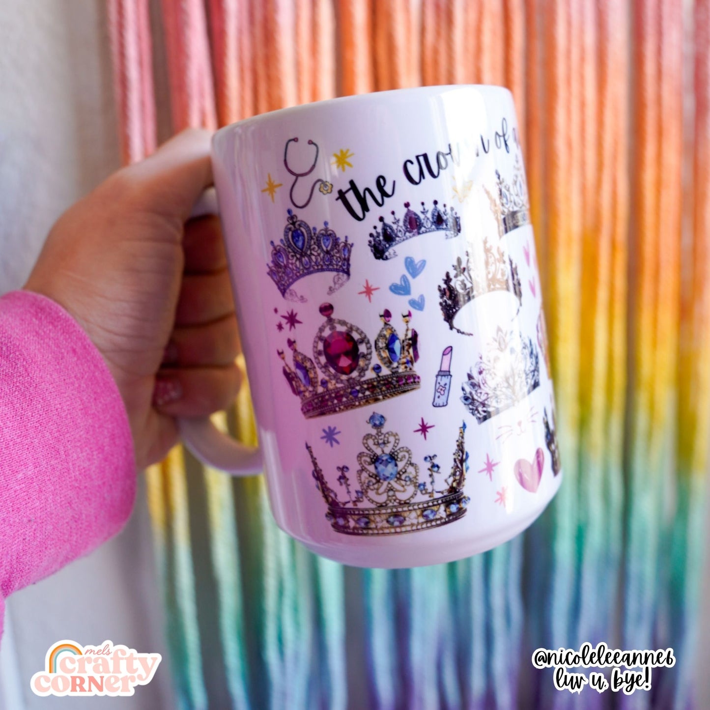 Hand holding the Crown of Authority mug by Mel's Crafty Corner