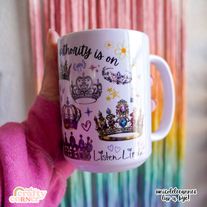 Hand holding the Crown of Authority mug by Mel's Crafty Corner