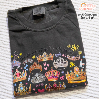 Folded pepper crewneck with the Crown of Authority design