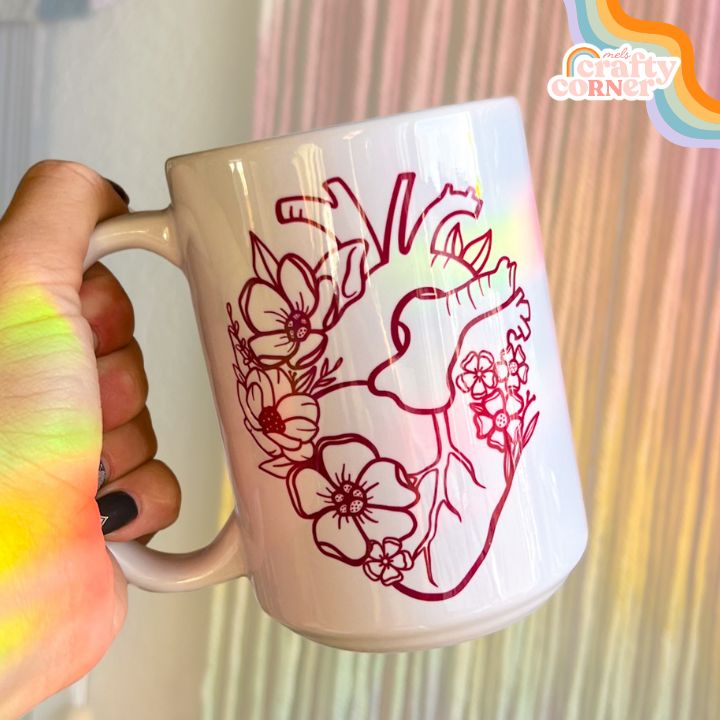 Floral Heart design on 15 oz ceramic mug, main product image by Mel's Crafty Corner