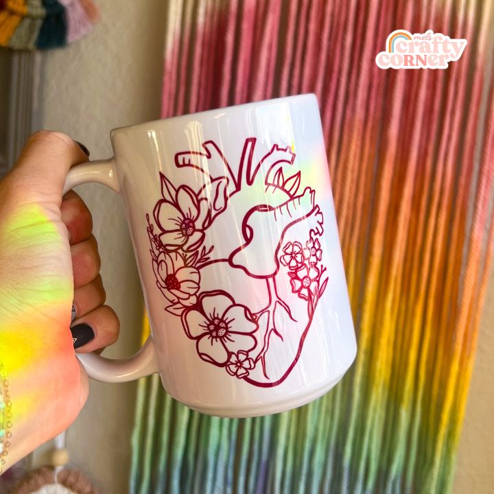 Primary side view of Floral Heart 15 oz ceramic mug showing main design by Mel's Crafty Corner