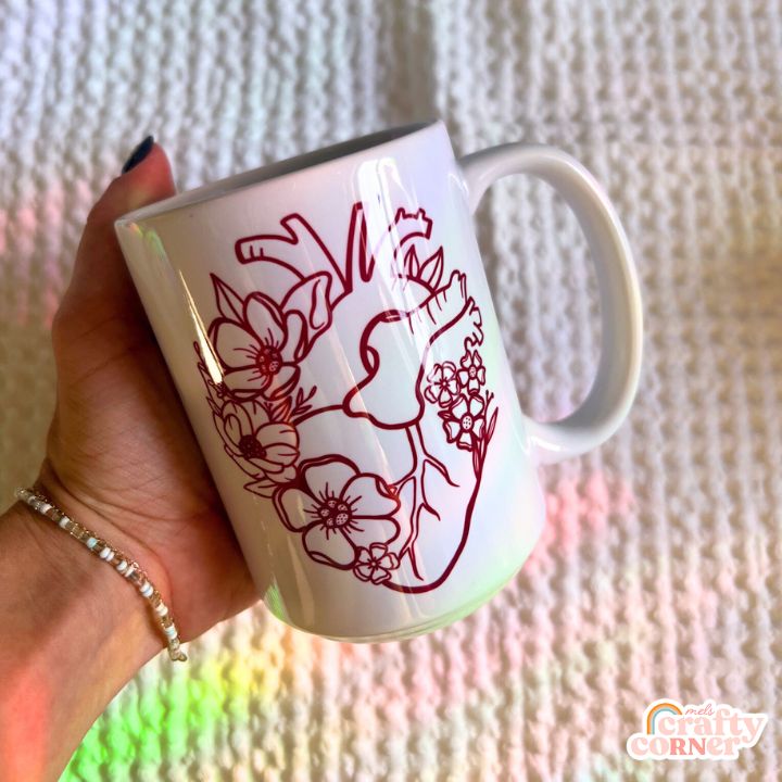 Side view of Floral Heart 15 oz ceramic mug showing secondary angle by Mel's Crafty Corner