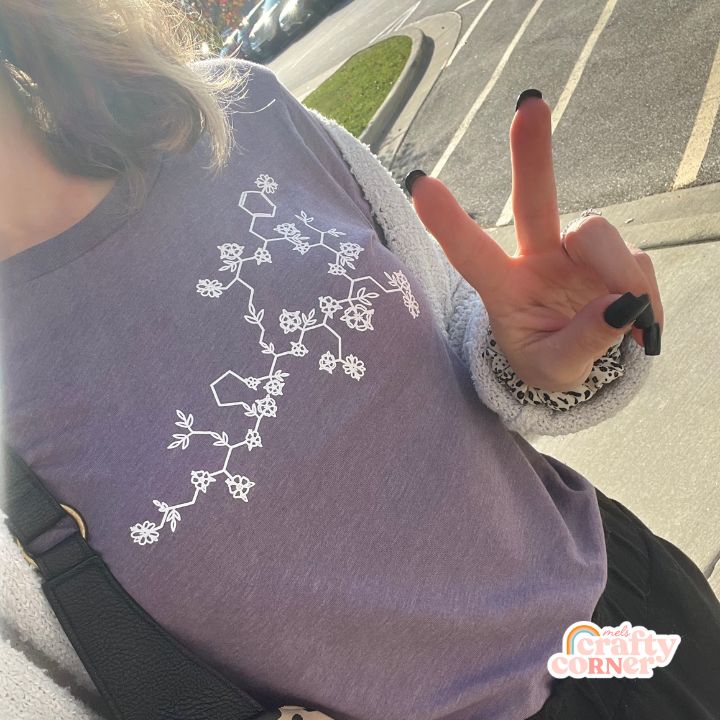 Model wearing Floral Oxytocin soft t-shirt