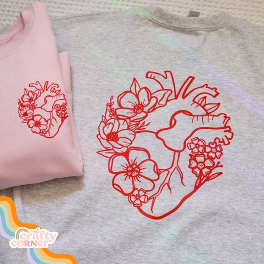 Floral Anatomical Heart design on classic crewneck sweatshirt, main product image by Mel's Crafty Corner