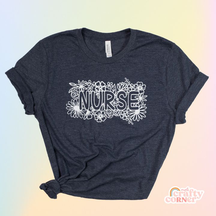 Heather navy blue Floral Nurse soft t-shirt product mockup