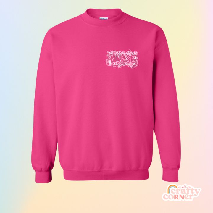 Heliconia pink Pocket Floral Nurse classic crewneck sweatshirt mockup by Mel's Crafty Corner