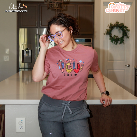 ICU Crew Merch design on mauve t-shirt modeled by Ashley, detailed view by Mel's Crafty Corner