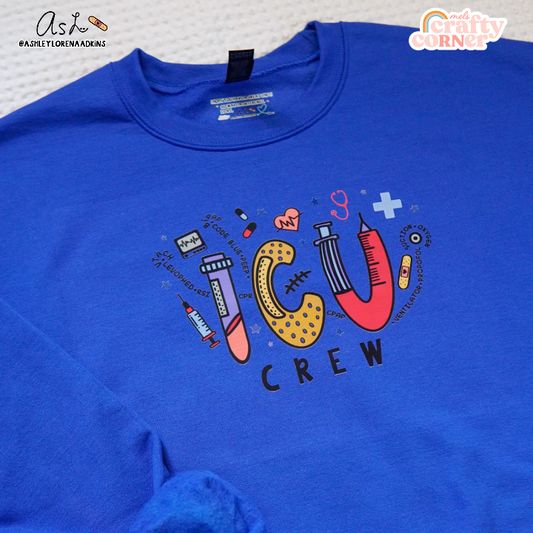 ICU Crew Merch design on royal blue crewneck sweatshirt, main product image by Mel's Crafty Corner