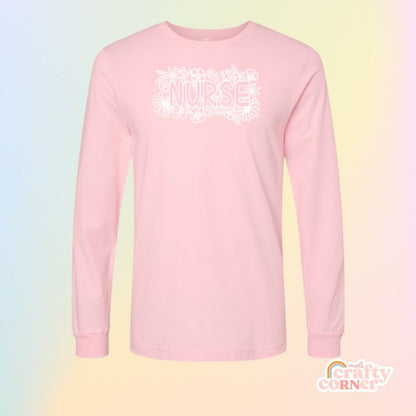 Pink Floral Nurse soft long sleeve shirt mockup by Mel's Crafty Corner