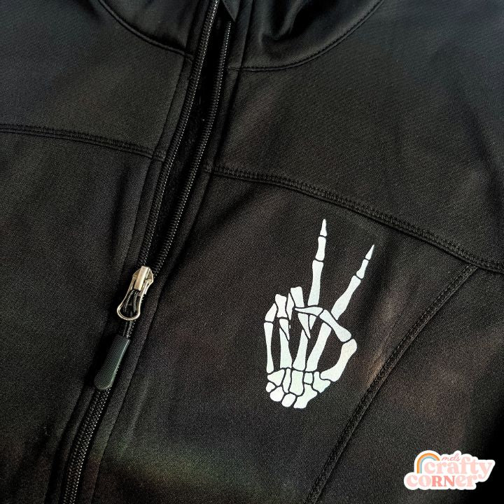 Flat lay view of Skeleton Peace Sign performance zip-up jacket by Mel's Crafty Corner