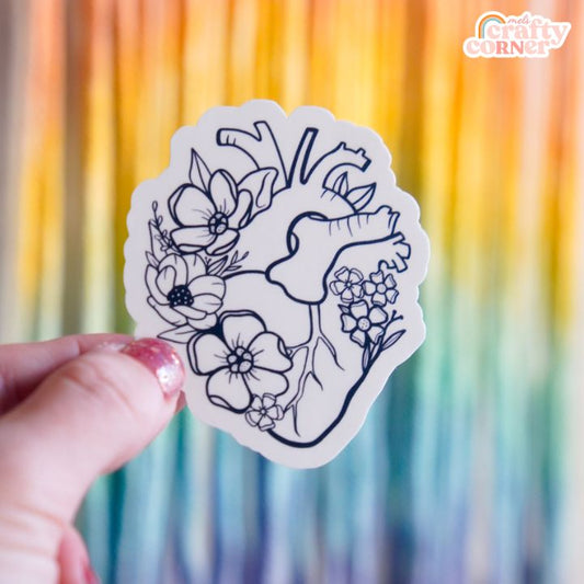 Floral Anatomical Heart design on black matte sticker, main product image by Mel's Crafty Corner