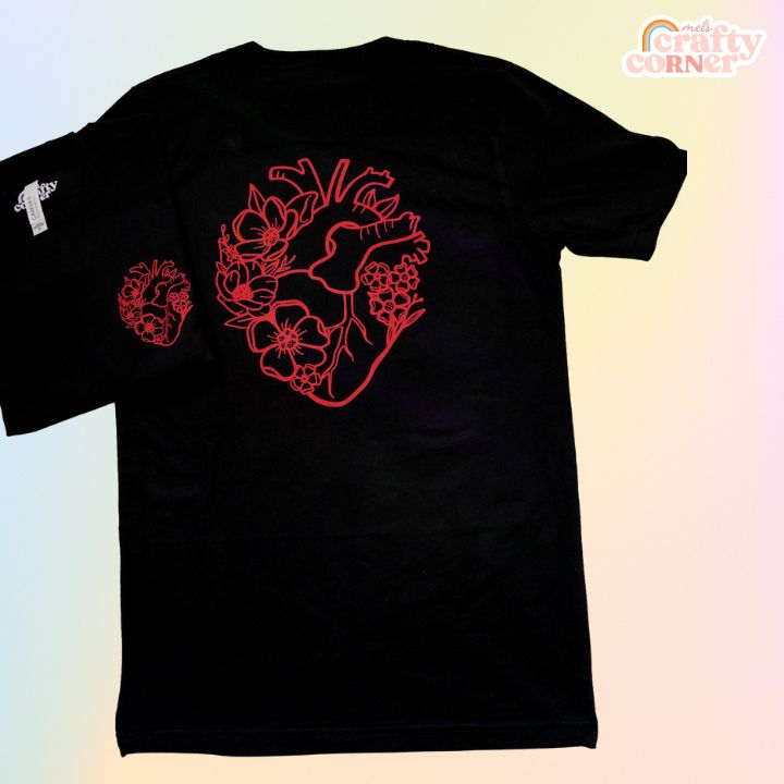 Model wearing black Floral Anatomical Heart softest t-shirt by Mel's Crafty Corner